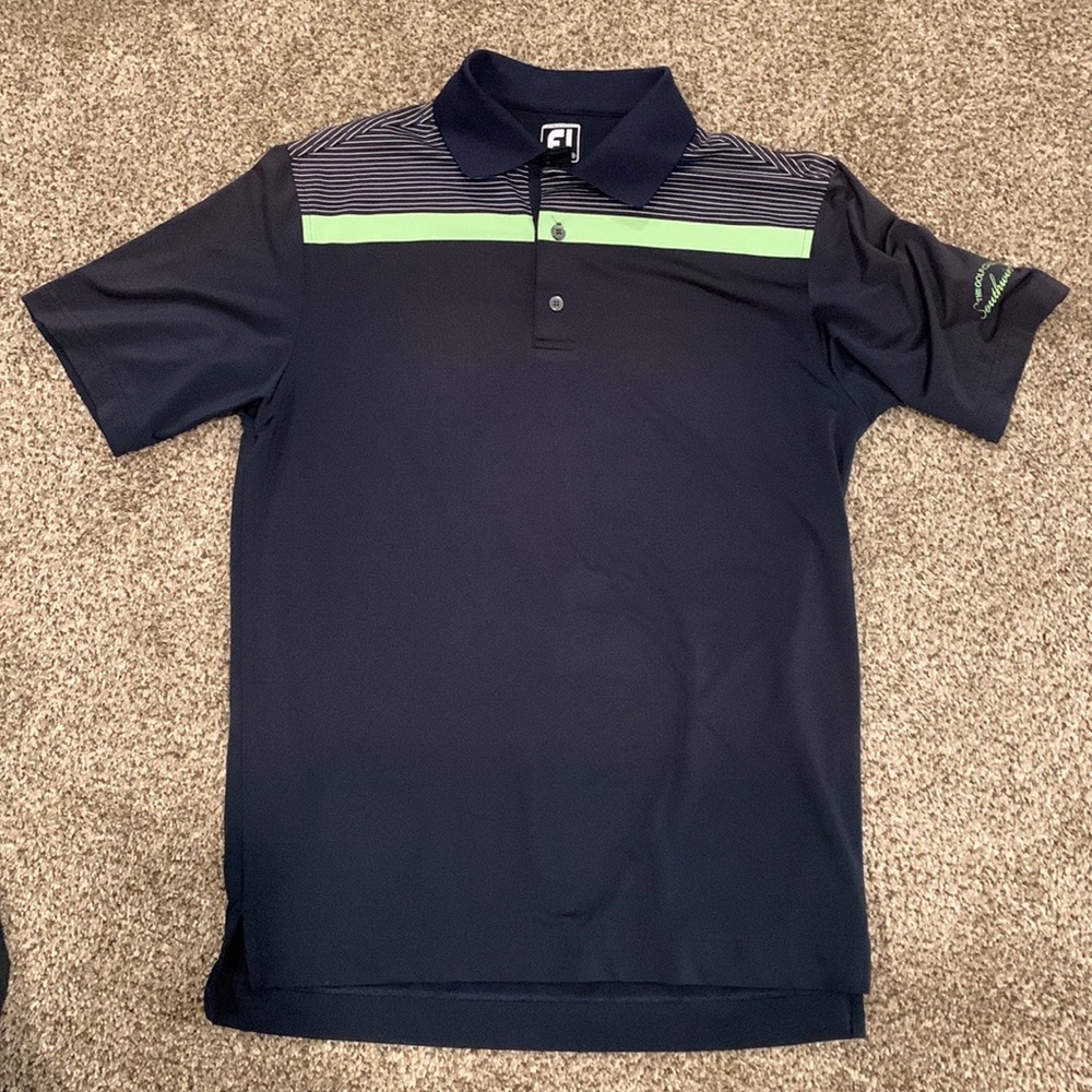 Footjoy Polo Size medium, used in good condition. Navy with lime green accents.